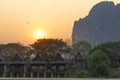 Sunset with hot air balloon in Vang Vieng, mountain view, bungalow by the river, Vang Vieng, Laos