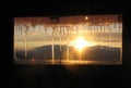 Sunset through an icy window Royalty Free Stock Photo