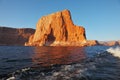 Sunset illuminate the rocks on the shore Royalty Free Stock Photo