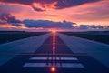 Sunset illuminates the airport runway with vibrant colors. Royalty Free Stock Photo