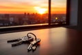 Sunset illuminates keys on a table in a new apartment