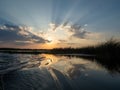 Sunset on Isaccel lake, Danube Delta, Romania Royalty Free Stock Photo