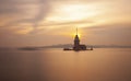 Sunset in ÃÂ°stanbul Bosphorus with maiden tower Royalty Free Stock Photo