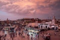 Sunset in Jemaa-el-Fna square, pink and cloudy sky. Marrakesh, Morocco Royalty Free Stock Photo