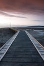 Sunset on the jetty in Morecambe Bay Royalty Free Stock Photo