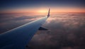 Sunset journey above urban skyline in commercial airplane aerial view generated by AI Royalty Free Stock Photo