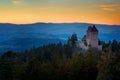 Sunset in Kasperk castle, Sumava, Czech Republic. Cold day in Sumava National park, hills and villages in the fog and rime, misty Royalty Free Stock Photo