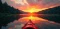 Sunset kayak on calm lake lush forest backdrop vacation fall forest Royalty Free Stock Photo