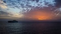 Sunset at La Gomera, Canary Islands.View from the harbour on the sea and approaching to the port ferry. Royalty Free Stock Photo