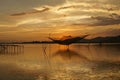 Sunset on Lak Lake, fishing equipment on the lake