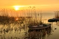 Sunset on the lake Balaton with a boat Royalty Free Stock Photo