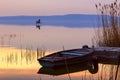 Sunset on the lake Balaton with a boat Royalty Free Stock Photo