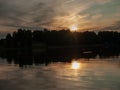 Sunset on the lake. beautiful colors. chaotic clouds