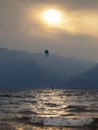 Sunset on Lake Como with a kiteboarder in background
