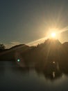 Sunset by a Lake House