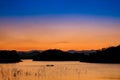 Sunset at lake Kaeng Krachan Dam on Silhouette Royalty Free Stock Photo