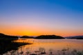Sunset at lake Kaeng Krachan Dam on Silhouette Royalty Free Stock Photo