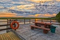 Sunset Lake Pier with Camping Table and Bench