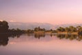 Sunset at the lake. Pink sky. Warm summer