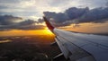 Sunset upon landing in an airplane Royalty Free Stock Photo