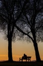 At sunset, In the landscape, alone, sitting man thinking