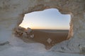 Sunset landscape with chalck rock formations at the White desert national park in Egypt Royalty Free Stock Photo