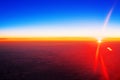 Sunset landscape, colorful sunrise over planet Earth, blue sky, bright yellow sun light rays red sunbeams, vibrant cosmic sunlight