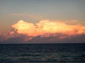 Sunset landscape at Indian ocean, big orange clouds over the water at summer Royalty Free Stock Photo