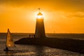 Sunset landscape with man sailing a boat around Lake Hefner Royalty Free Stock Photo