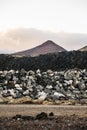 Landscape of mountains and volcanic rock soil