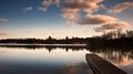 Sunset landscape over jetty on lake Royalty Free Stock Photo