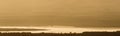 Sunset landscape over the salt lake of Bahariya oasis as seen from the top of Jebel Dist