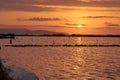 Sunset landscape of salt pans in traditional salt production in Trapani, Sicily, italy. Salt flats. Salt mines of Trapani in Italy Royalty Free Stock Photo