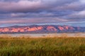 Sunset landscape in South San Francisco bay, colorful clouds covering the sky; mountains slopes and peaks part of the Diablo Royalty Free Stock Photo