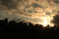 Sunset landscape view of silhouette mountains with sky and clouds and sun,twilight sky and clouds with evening sunset background,