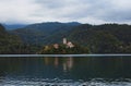 Sunset landscape view of small island with Pilgrimage Church of the Assumption of Maria on Bled Lake Royalty Free Stock Photo
