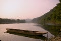 Sunset landscpae of yangshuo - boat on a rvier Royalty Free Stock Photo