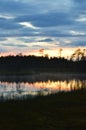 Sunset late summer evening. Rovaniemi Finland. Strong blue cloudy sky.