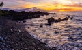 Sunset On The Lava Rock Shoreline of Ulua Beach