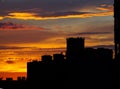 Sunset and layered cumulus clouds over the residential area