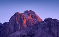 Sunset light on Jof Fuart peak from Valbruna town.