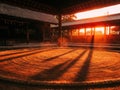 Sunset light and long shadows in the empty dohyo during the evening Royalty Free Stock Photo