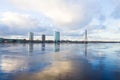 Sunset light over bridge and river in Riga