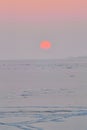 Sunset light over the frozen lake Balaton in Hungary Royalty Free Stock Photo