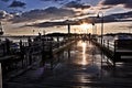 Sunset Light Reflecting on Wet Fishing Pier