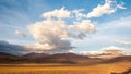 Sunset light on volcanos of Atacama Desert. Mountains southern from San Pedro de Atacama. Stunning scenery in evening sunlight at Royalty Free Stock Photo