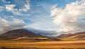 Sunset light on volcanos of Atacama Desert. Mountains southern from San Pedro de Atacama. Stunning scenery in evening sunlight at Royalty Free Stock Photo