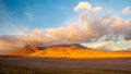 Sunset light on volcanos of Atacama Desert. Mountains southern from San Pedro de Atacama. Stunning scenery in evening sunlight at Royalty Free Stock Photo