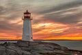 Sunset at the Lighthouse at Peggy`s Cove near Halifax, Nova Scot Royalty Free Stock Photo