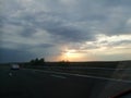 Sunset lights on the highway in the summer Royalty Free Stock Photo